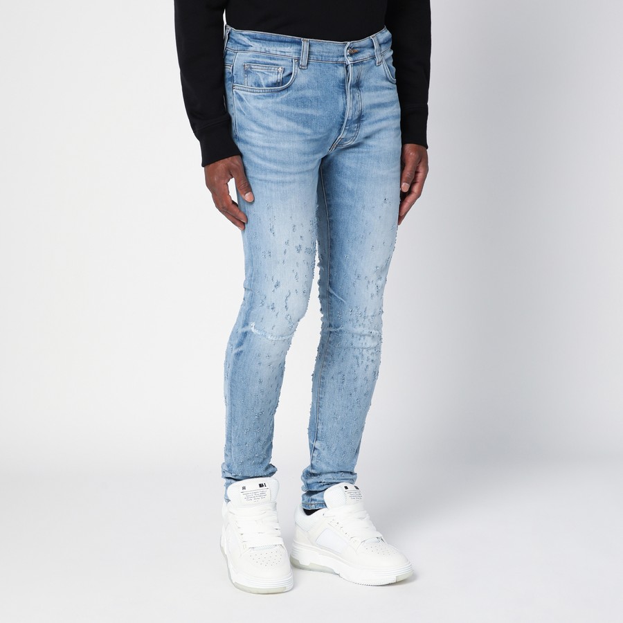 AMIRI Light blue washed skinny jeans with wear | TheDoubleF