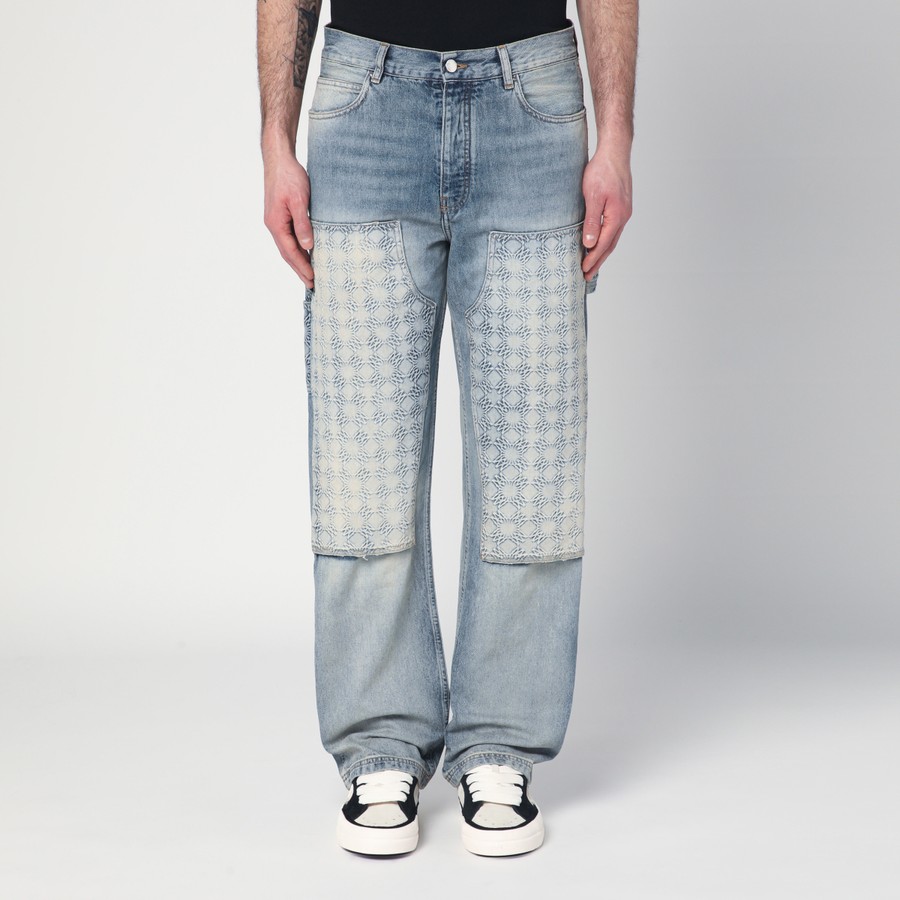 AMIRI Jeans slavato con pannello decorato TheDoubleF
