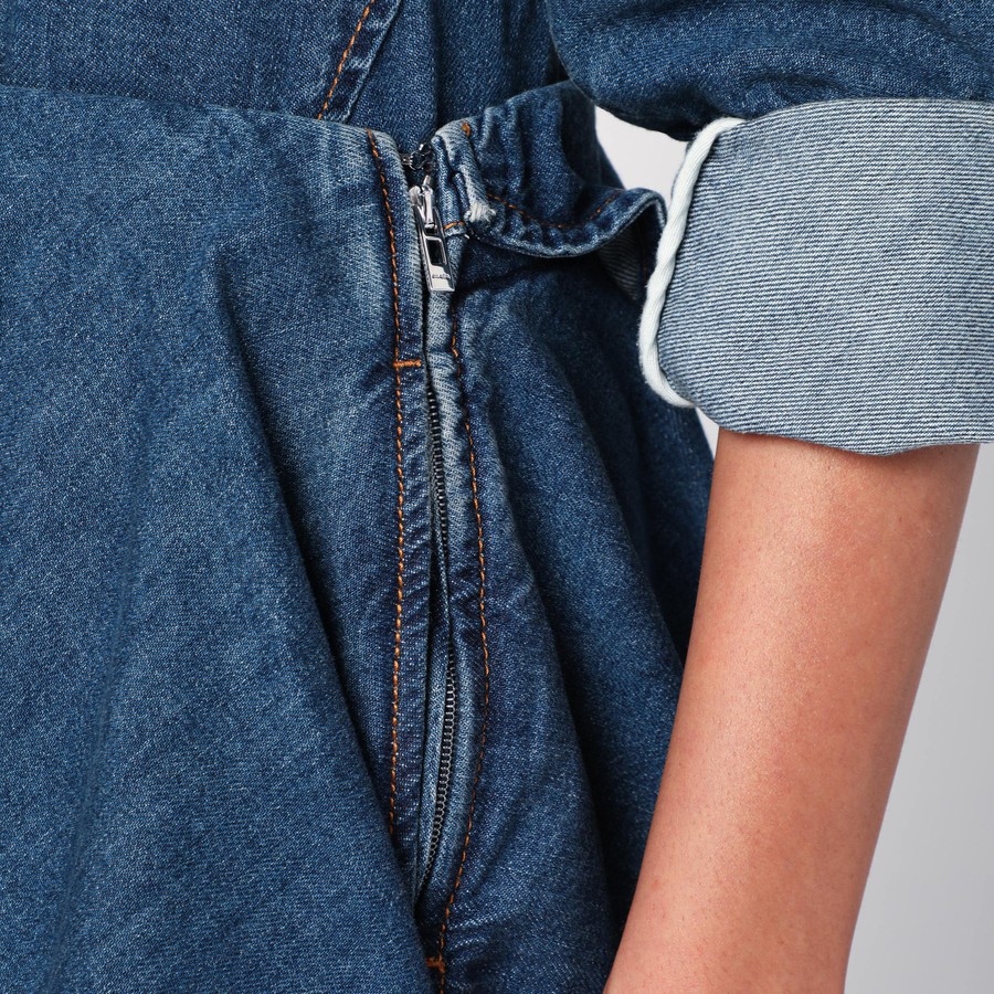 Alaïa Asymmetrical spiral denim skirt | TheDoubleF