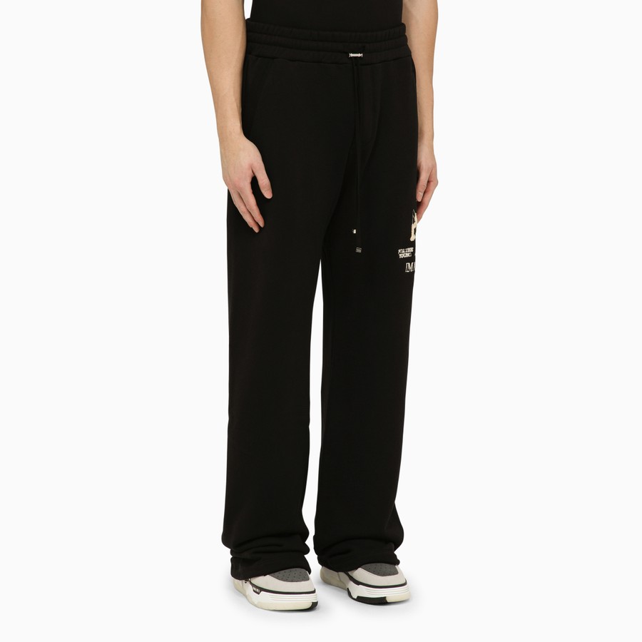 【送料&関税込】AMIRI Pants AMIRI Black jogging trousers with logo | TheDoubleF
