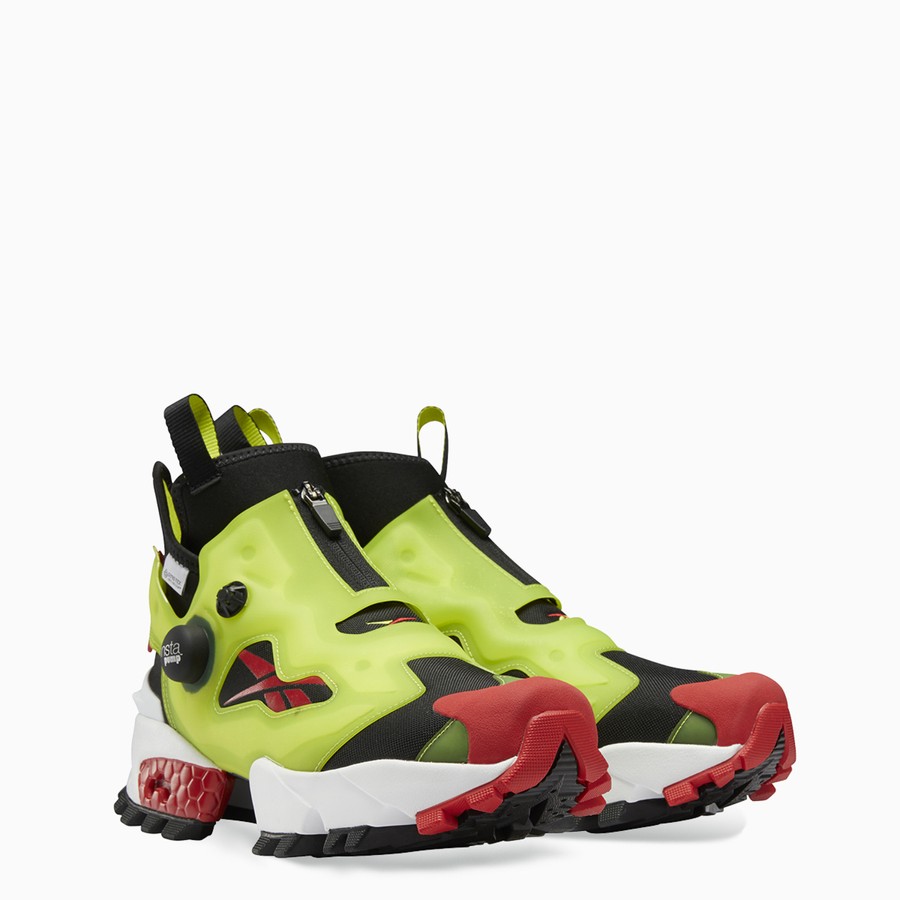 black and yellow reebok pumps