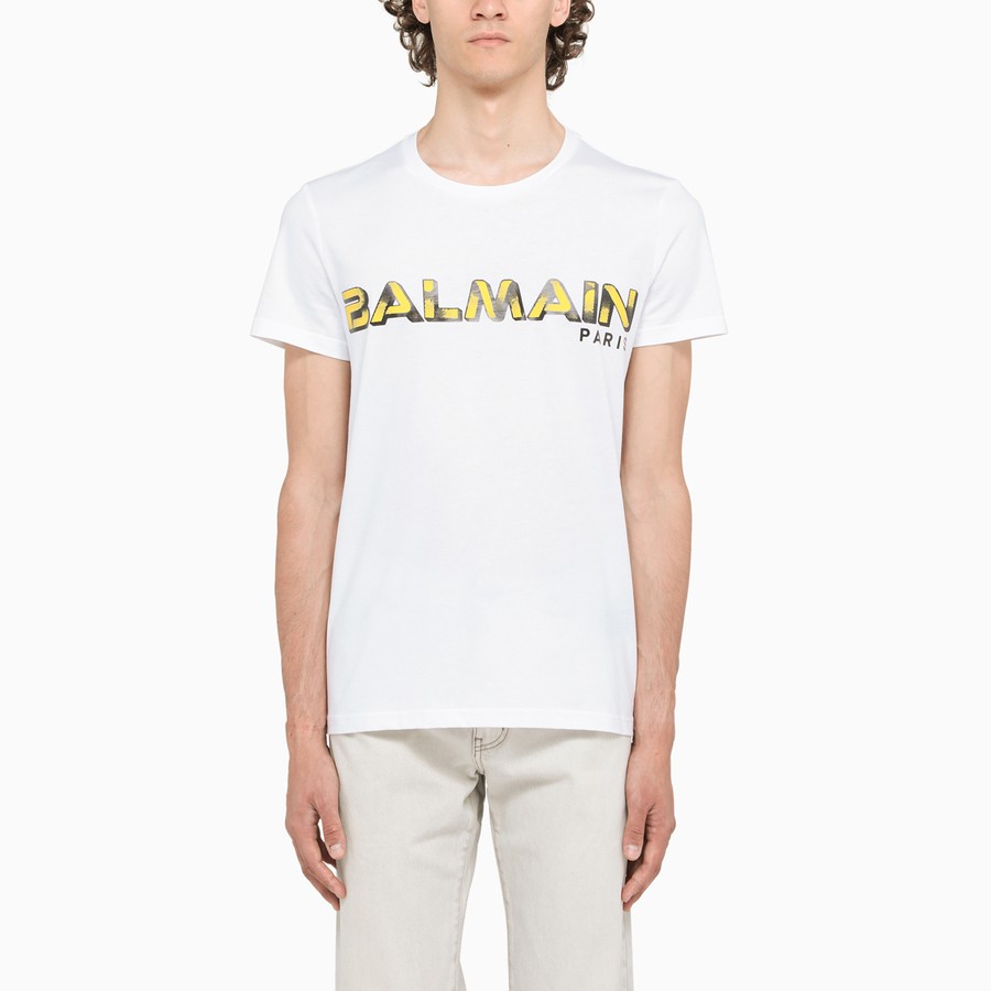 white shirt with yellow writing