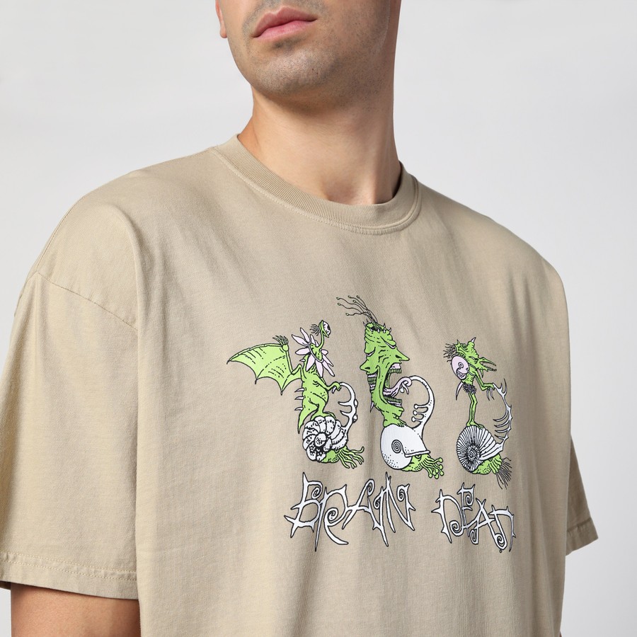 Tシャツ・カットソー BRAIN DEAD Men T Shirts F24T00004086CO Beige Brain Dead Beige cotton T-shirt with print | TheDoubleF