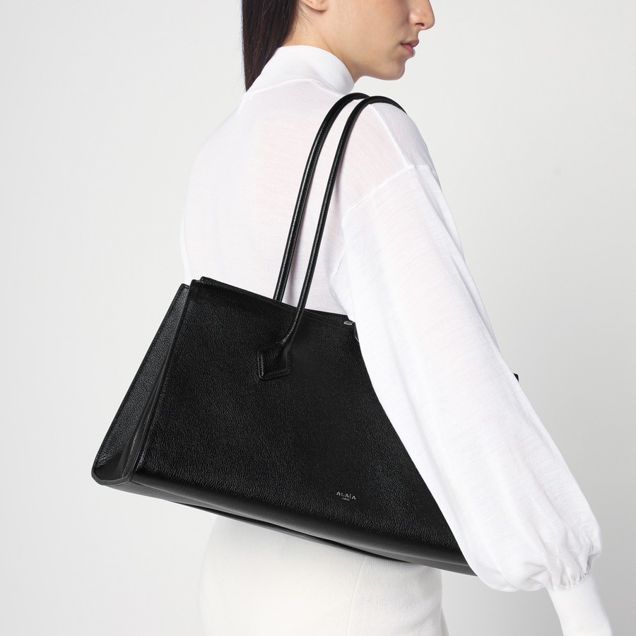 Alaïa Le Teckel black leather tote bag | TheDoubleF