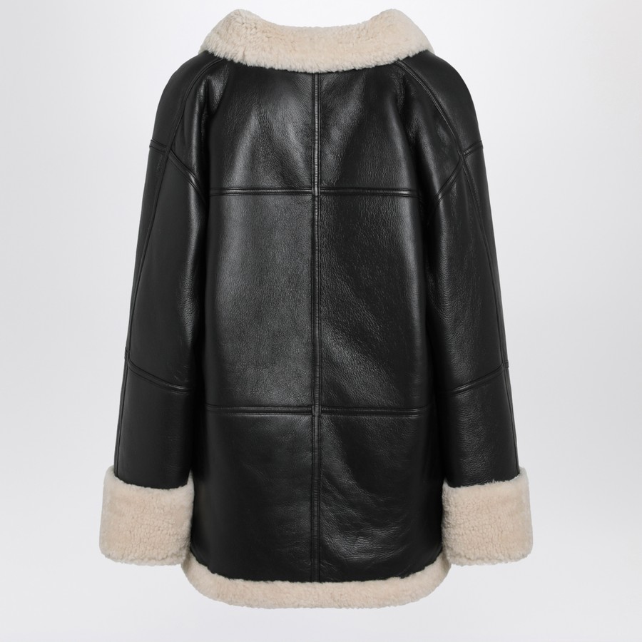 TOTEME Black leather zipped jacket with shearling lining | TheDoubleF