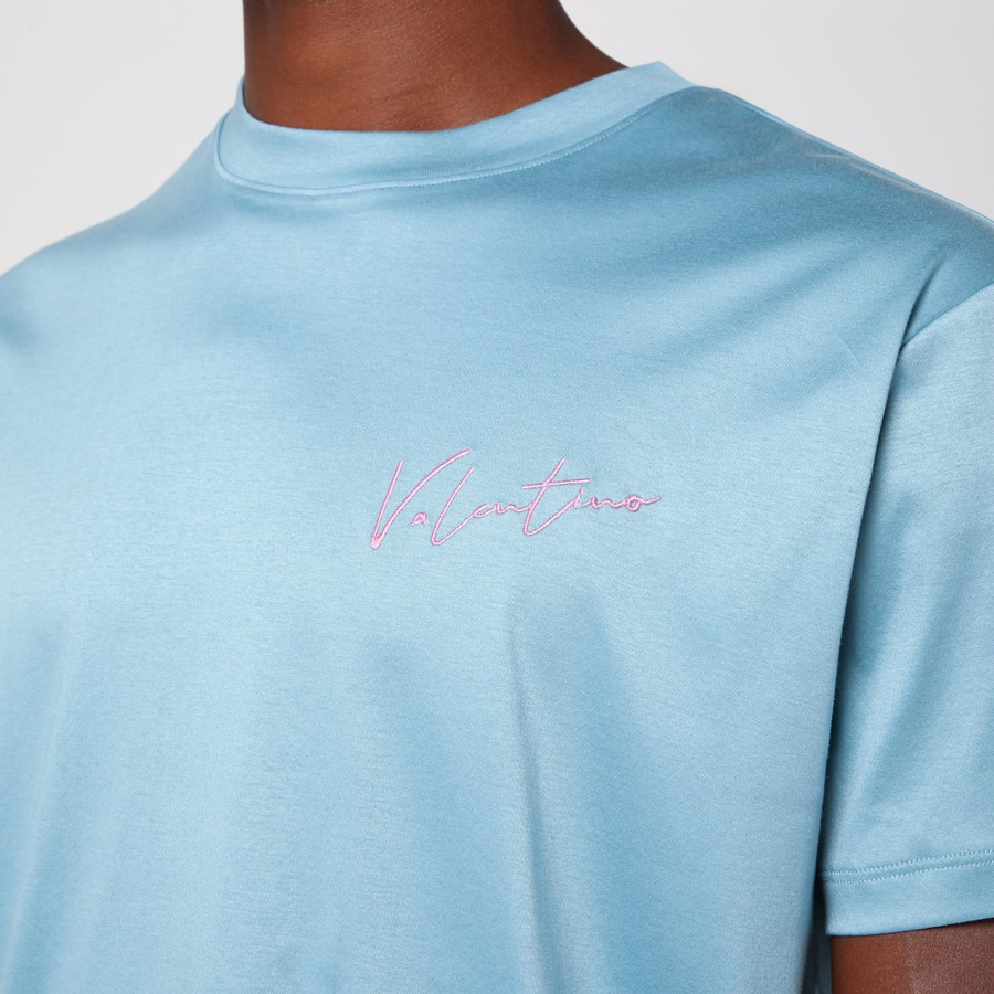 トップスその他 Valentino Light blue T-shirt with logo patch Valentino Light blue T-shirt with Vlogo Signature print