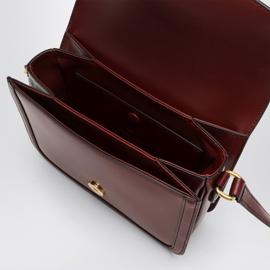 バッグ・カバンその他 Valentino Garavani Small 9TO5 bag in bordeaux Valentino Garavani Small 9TO5 bag in bordeaux | TheDoubleF