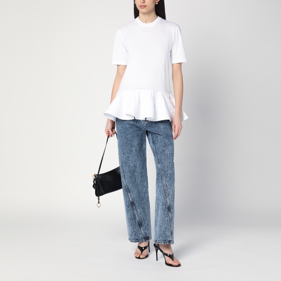 Alaïa Twisted stonewashed denim jeans | TheDoubleF