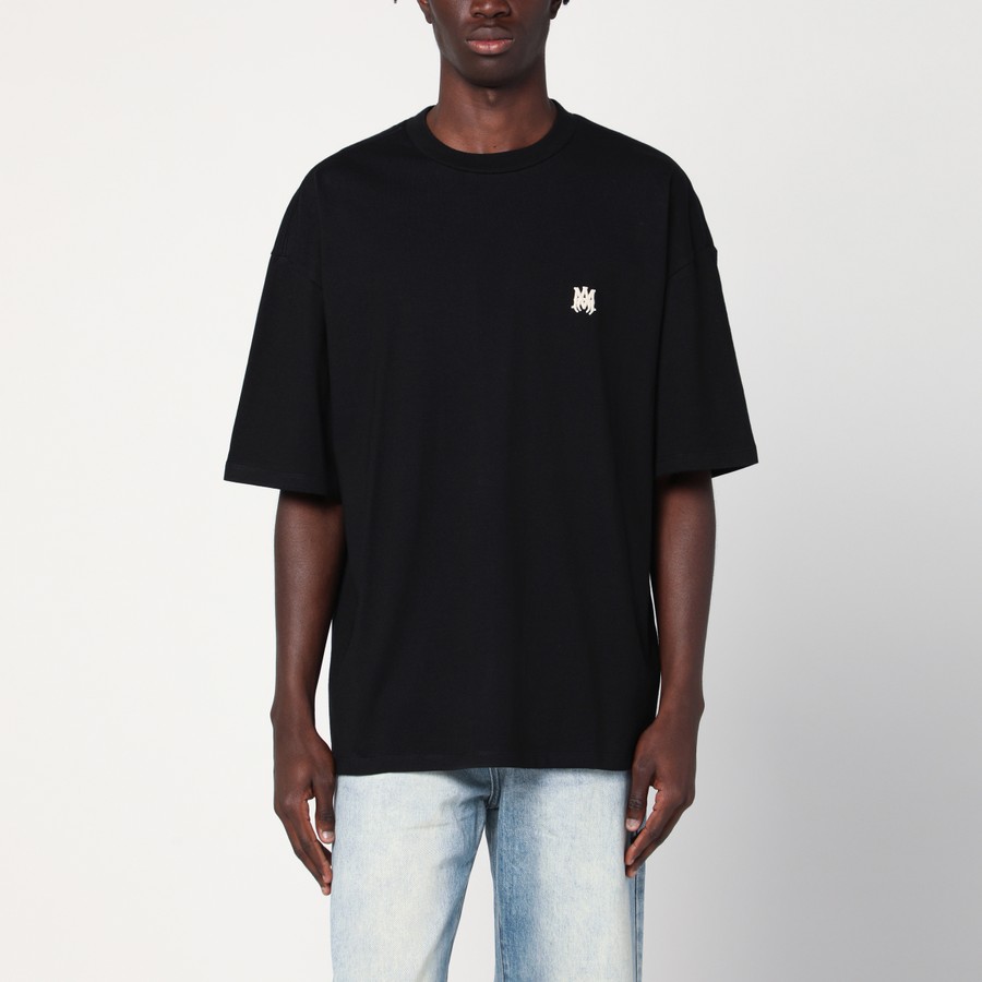 Tシャツ・カットソー Amiri Black Cotton T-Shirt With Logo Patch AMIRI Black cotton T-shirt with logo patch | TheDoubleF