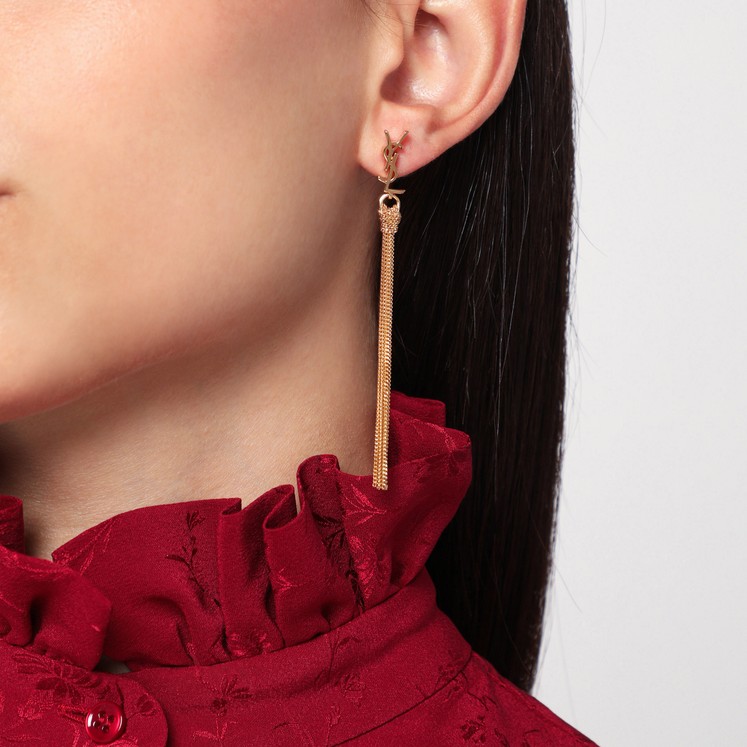Saint Laurent Asymmetrical earrings with pearl and Cassandre