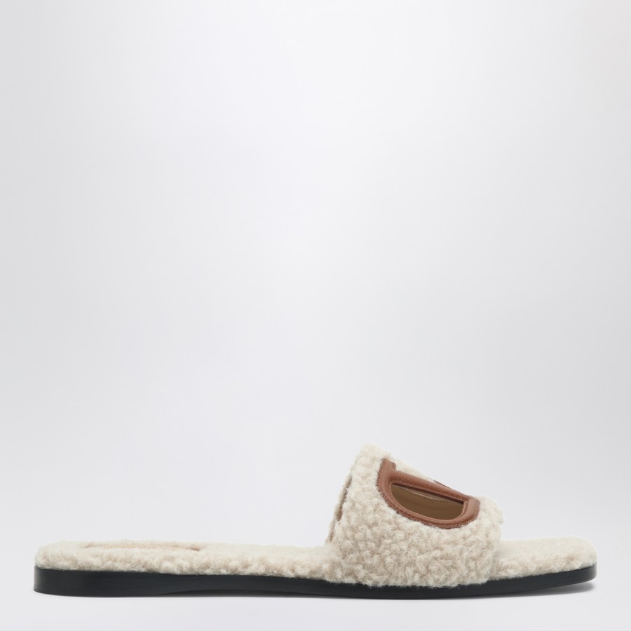 シューズ・サンダルその他 Valentino Garavani Sandalo Slide Vlogo Cut-out in shearling Valentino Garavani Sandalo Slide Vlogo Cut-out in shearling