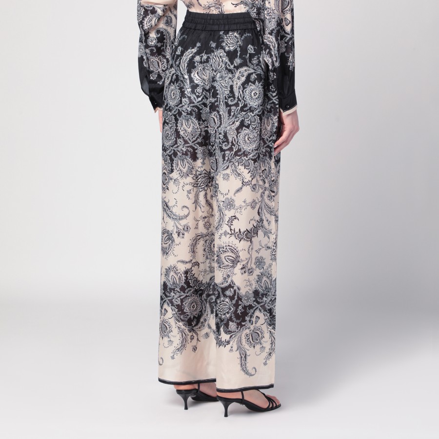 ボトムスその他 ZIMMERMANN Cream Rhiannon trousers with fantasy print ZIMMERMANN Cream Rhiannon trousers with fantasy print