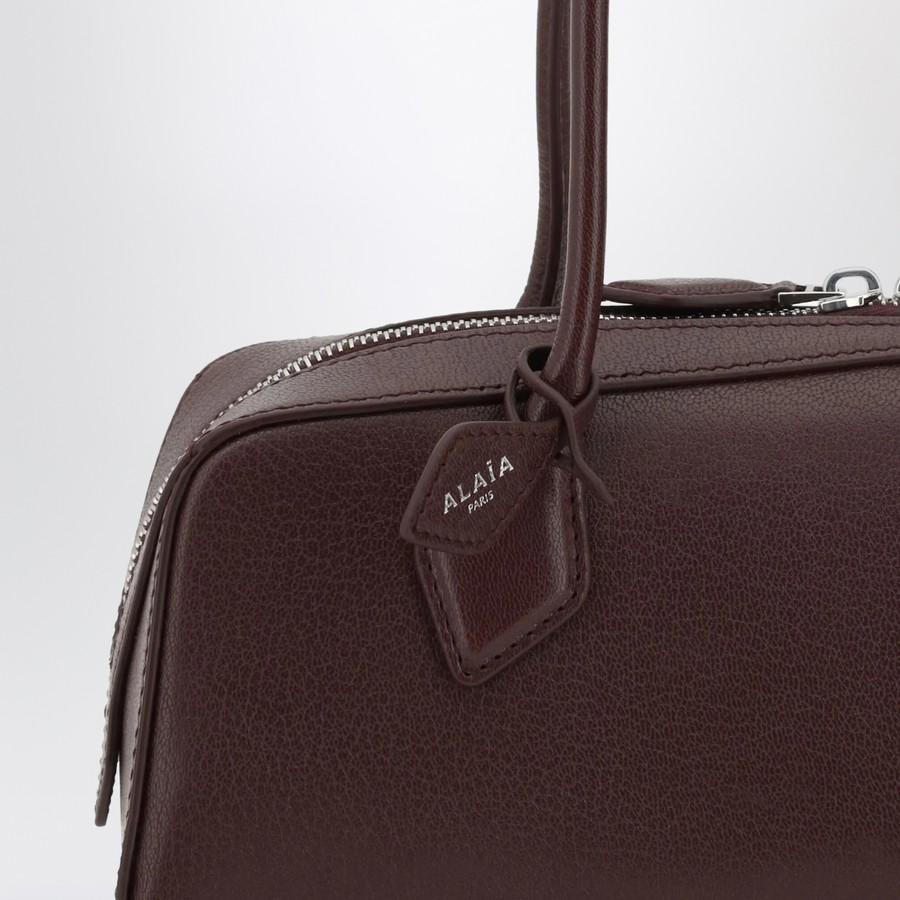 Alaïa Medium-sized Le Teckel garnet red bag | TheDoubleF