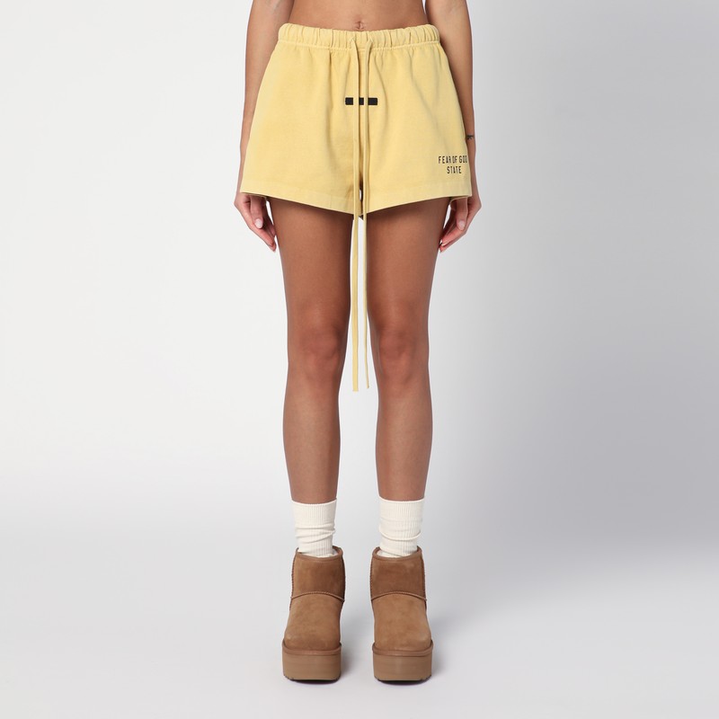Amber coloured shorts with logo