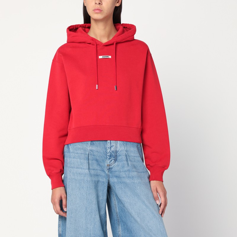 Red hoodie with logo patch