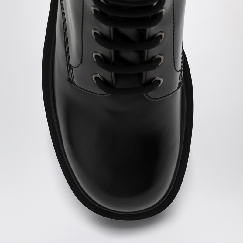 Prada Logo-plaque Panelled Ankle Boots In Black