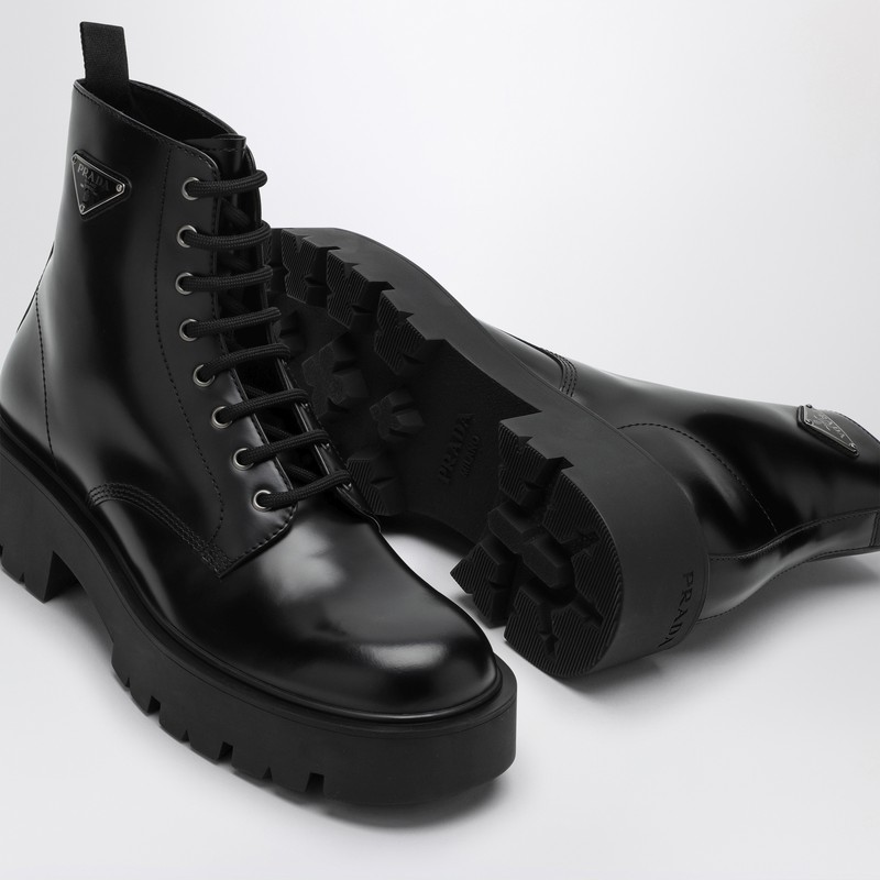 Prada Logo-plaque Panelled Ankle Boots In Black