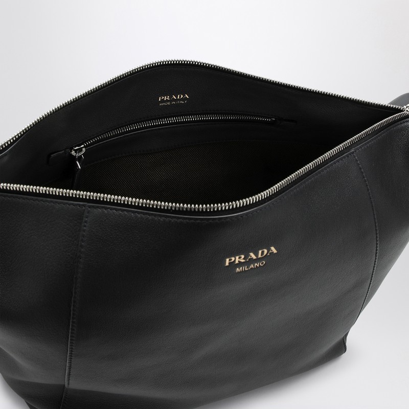 Prada Logo Print Leather Messenger Bag In Black