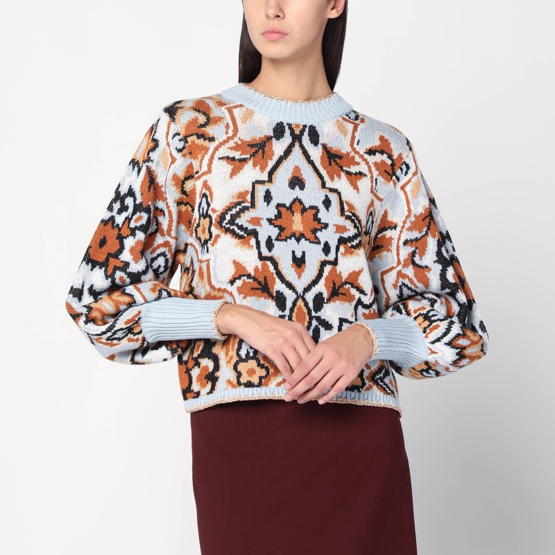 Light blue sweater with tapestry detail
