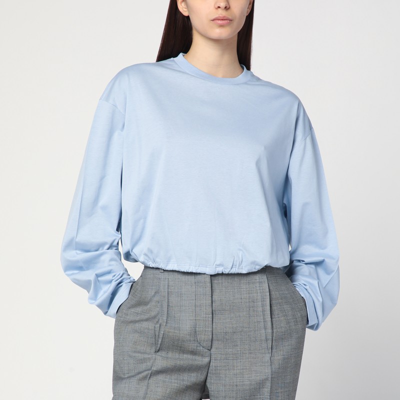 Light blue sweater with elastic hem