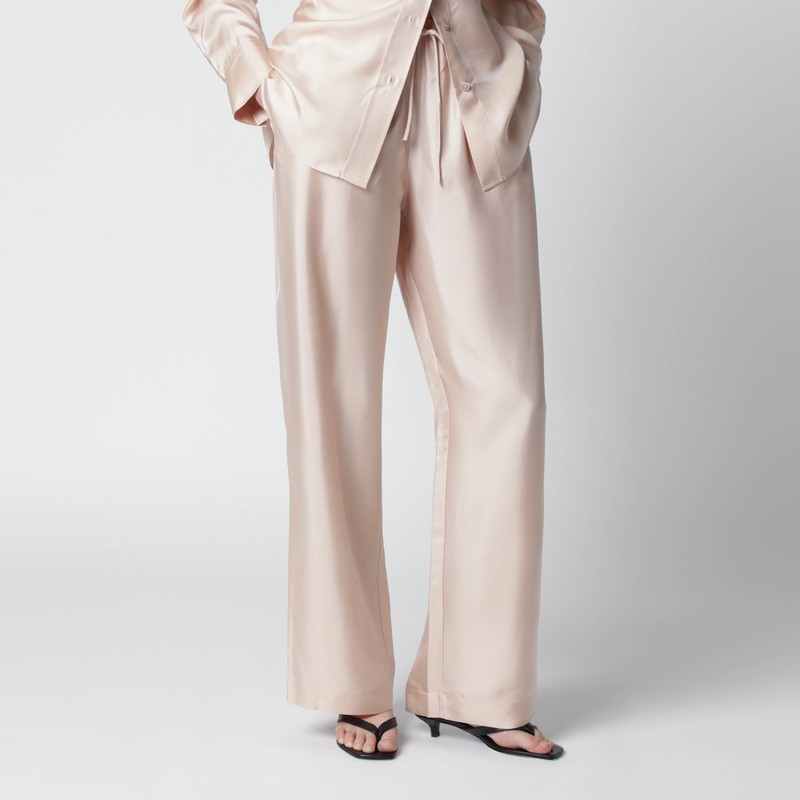 Light pink silk trousers