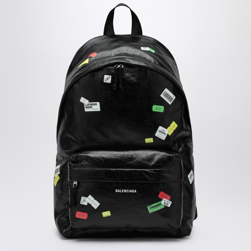 Black Explorer backpack in leather with printed stickers