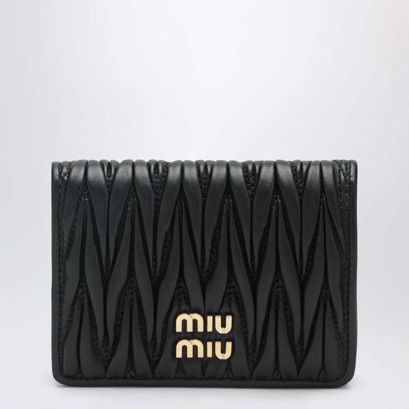 Compact wallet in black quilted nappa