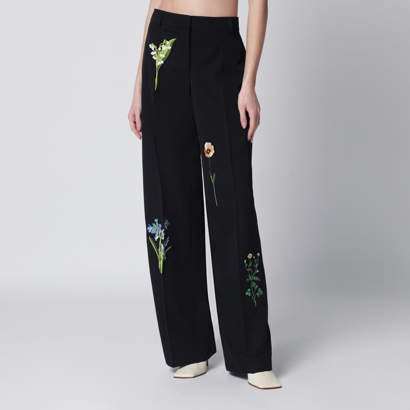 Black wool trousers with floral embroidery