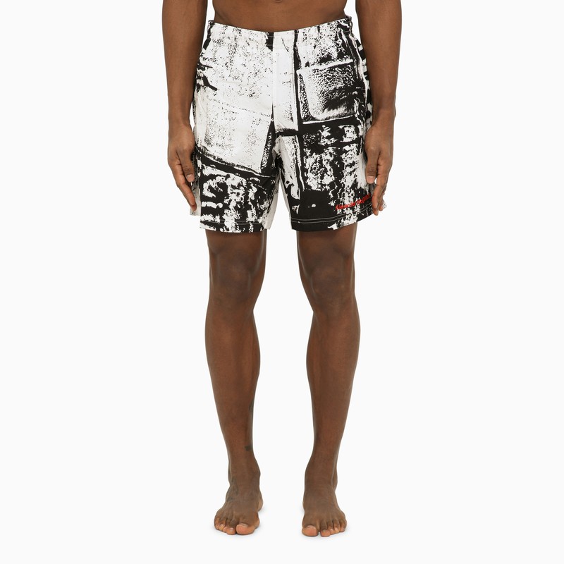 Abstract print swim shorts with logo