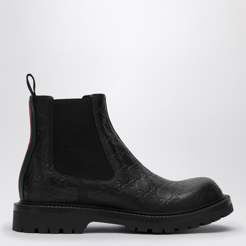 Black leather ankle boot with Web detail