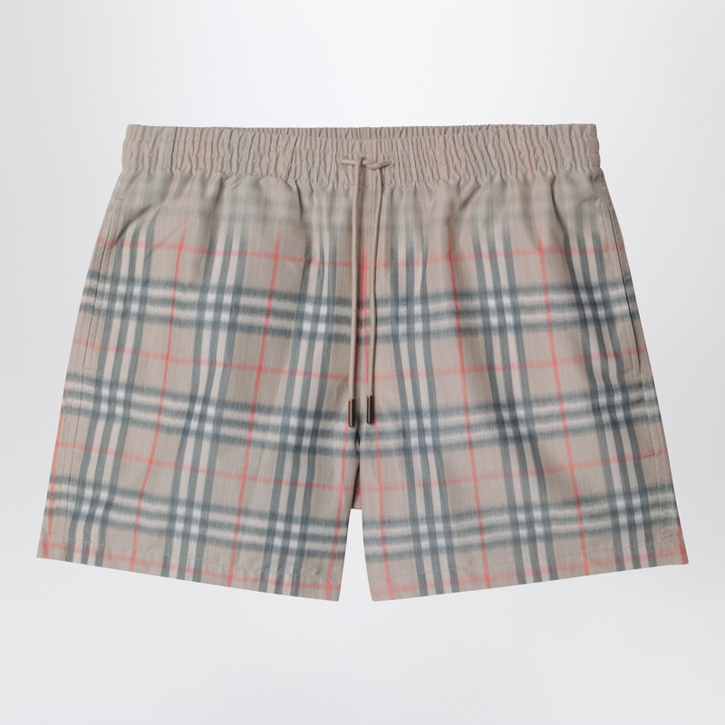 Beige swim shorts with faded Check pattern