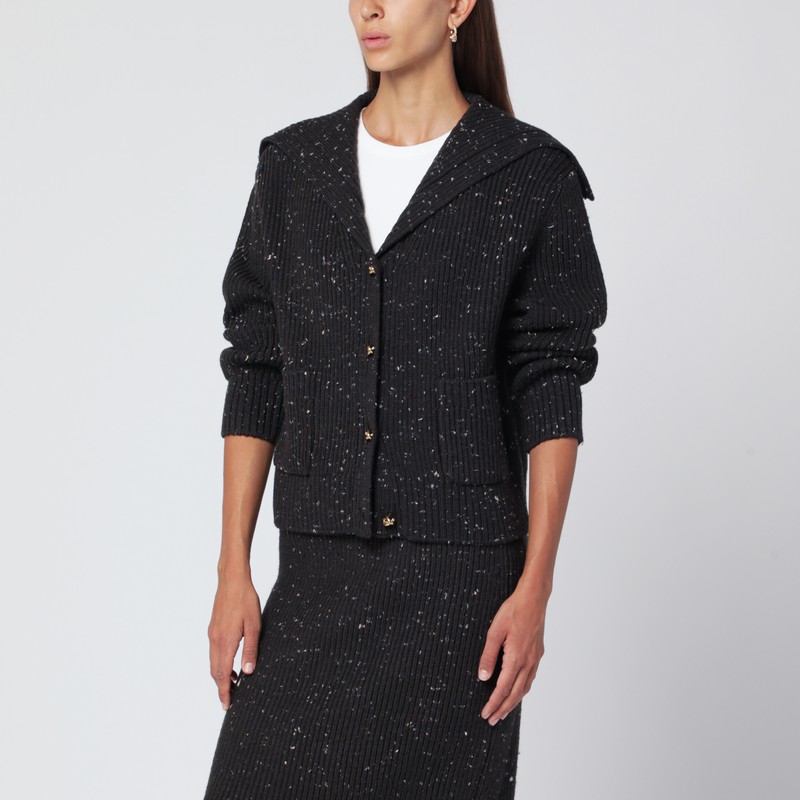 Cardigan in English wool with a melting ribbed texture