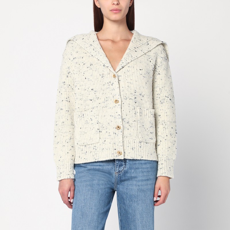 Cardigan in English wool with a melting ribbed texture