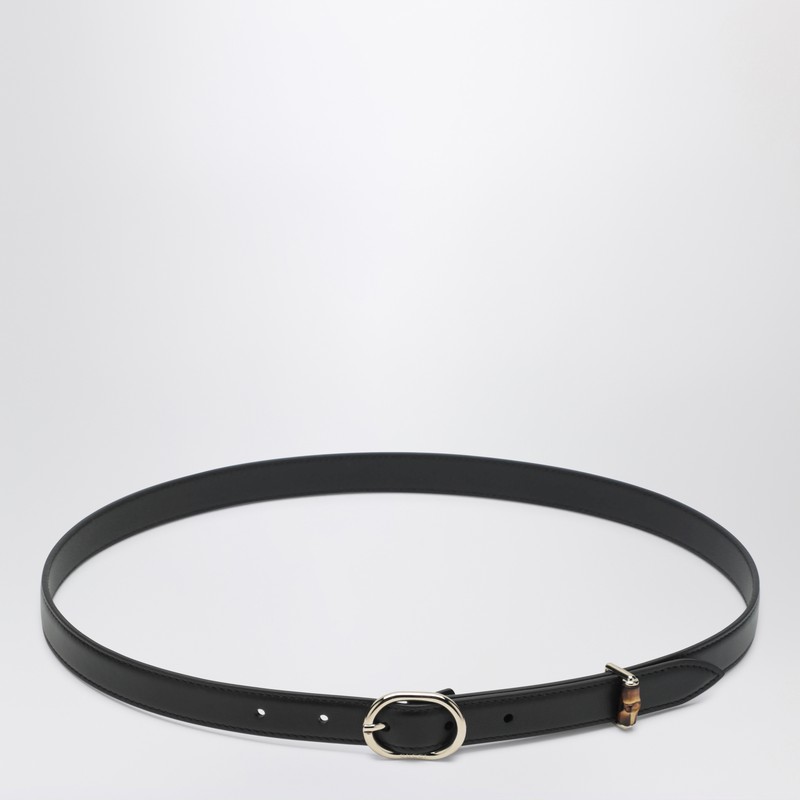 Thin black belt with oval buckle