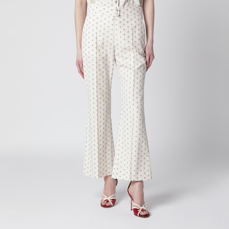 Ivory trousers with floral pattern
