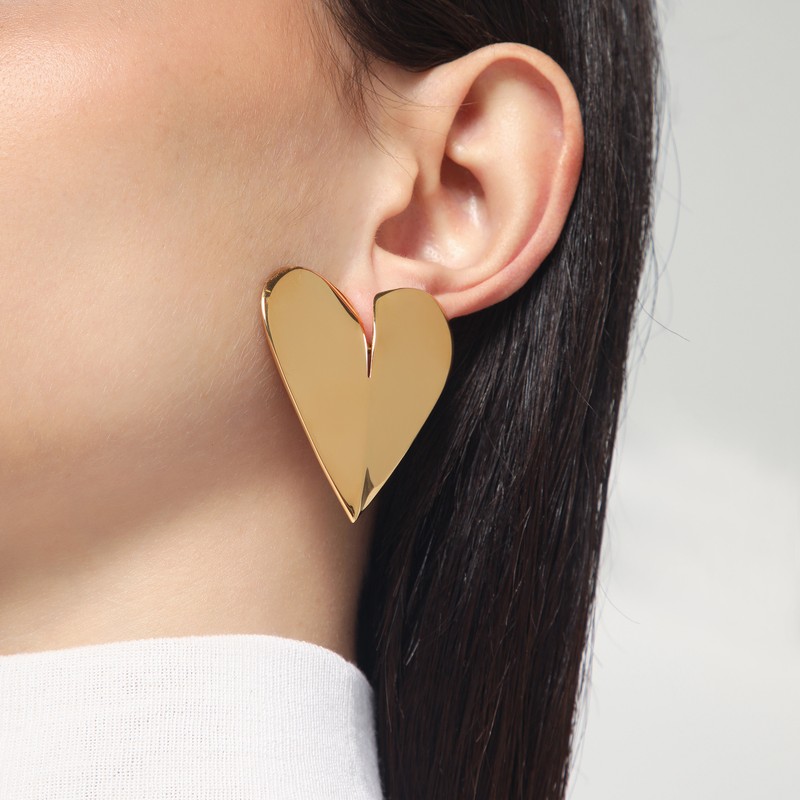 Alaïa Le Coeur Torn Gold Earrings In Silver | ModeSens