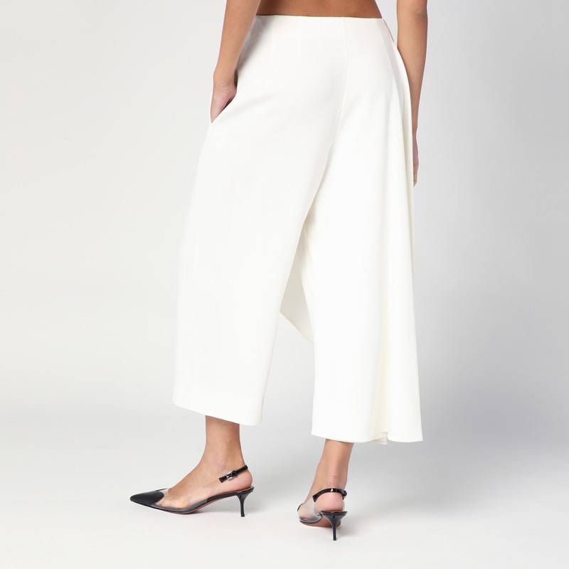 パンツ ALAIA WHITE ASYMMETRICAL TROUSER SKIRT Alaïa White Asymmetrical Trouser Skirt | ModeSens