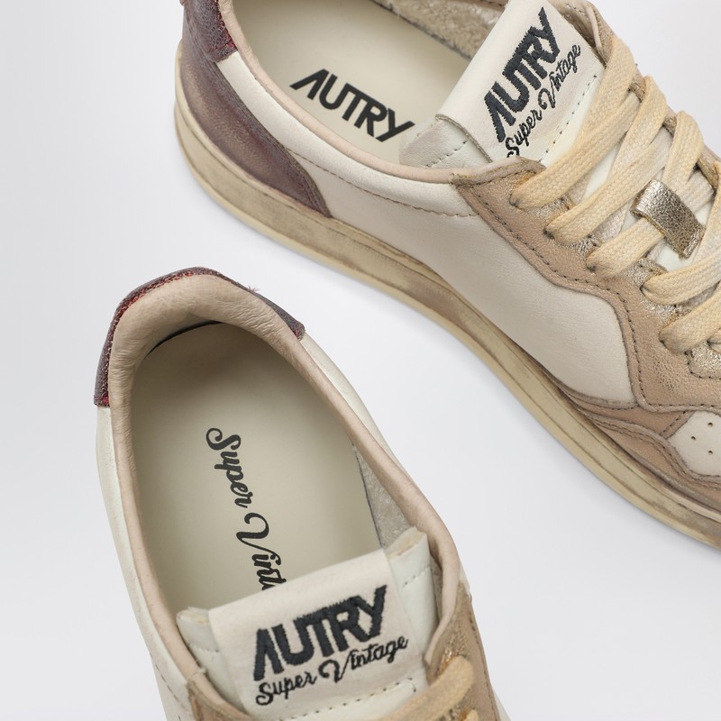 Autry Super Vintage Distressed Paneled Metallic Leather Sneakers In Pink