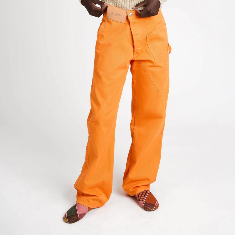 Bright orange twisted-denim jeans