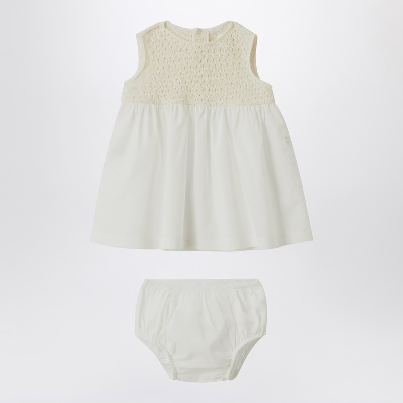 Cream-colored openwork knit dress with voile