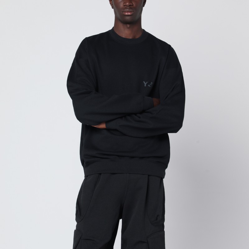 Black crewneck sweatshirt with logo