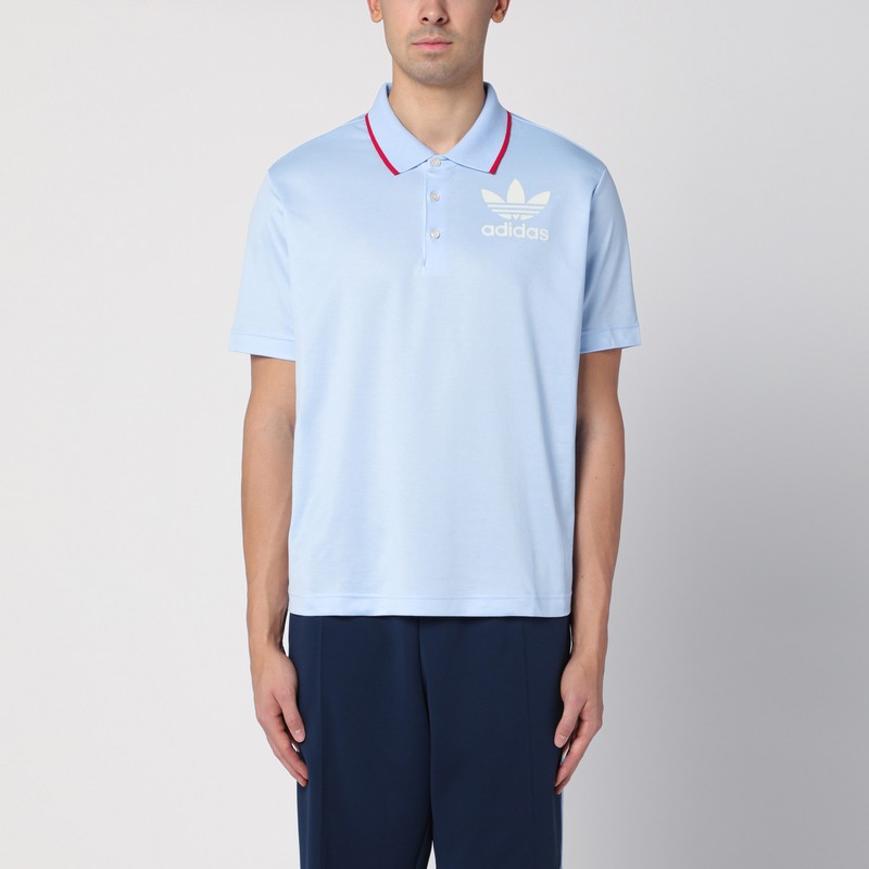 Light blue polo shirt with logo