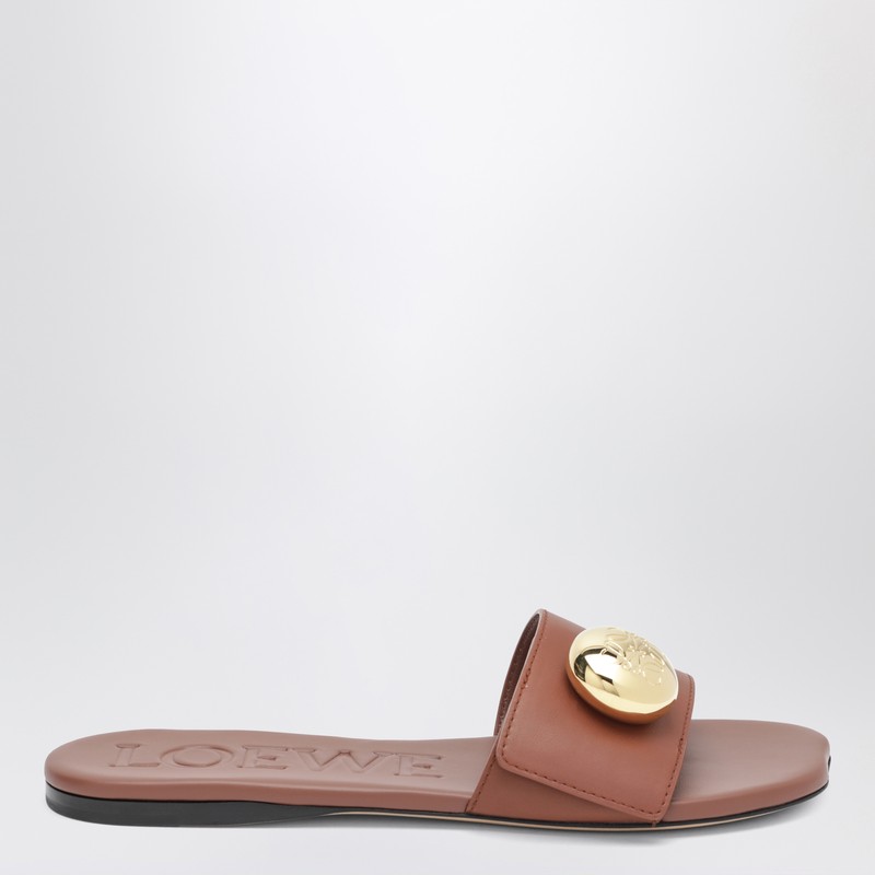 Rust-colored Pebble slides in leather