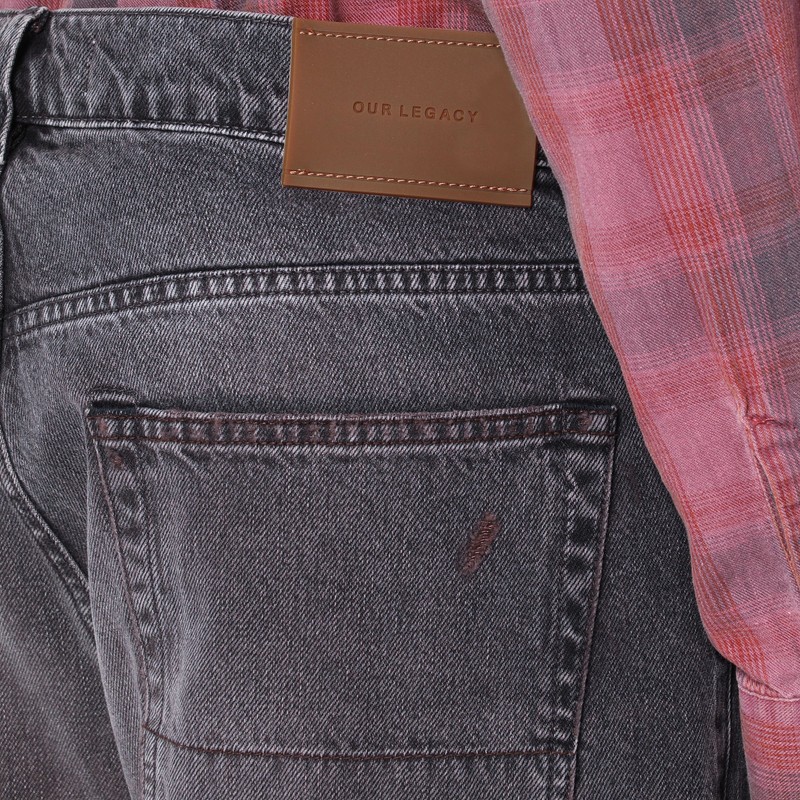 Our Legacy Faded Effect Jeans With Rips In Brown