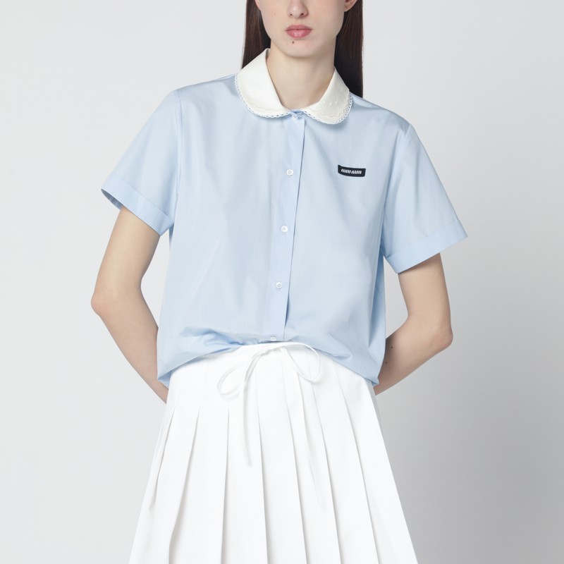 Light blue short-sleeved shirt with logo
