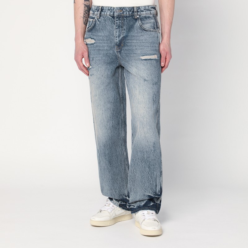 Washed blue jeans with rips