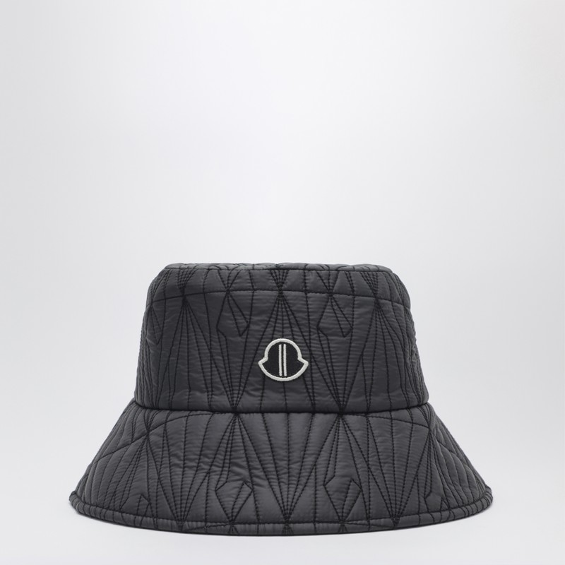 Black quilted hat with logo patch