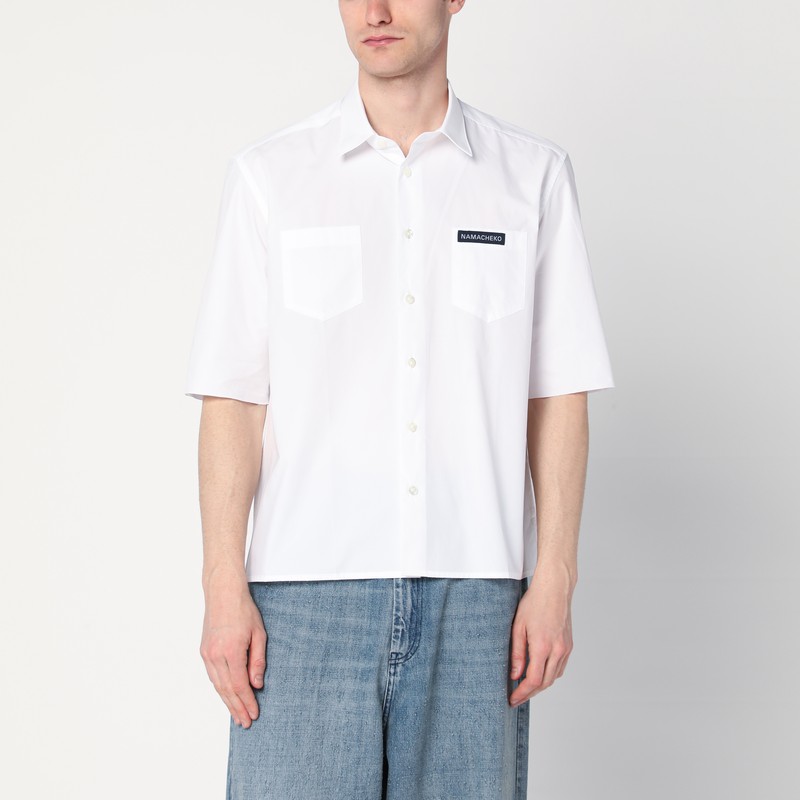 White shirt with logo patch