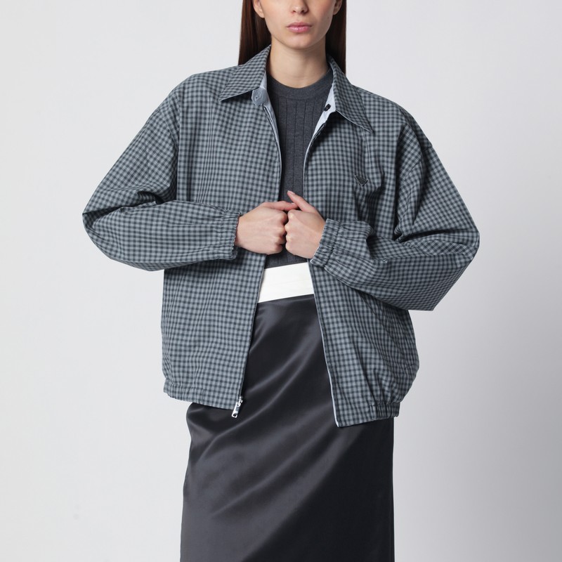 Reversible light blue jacket with check pattern