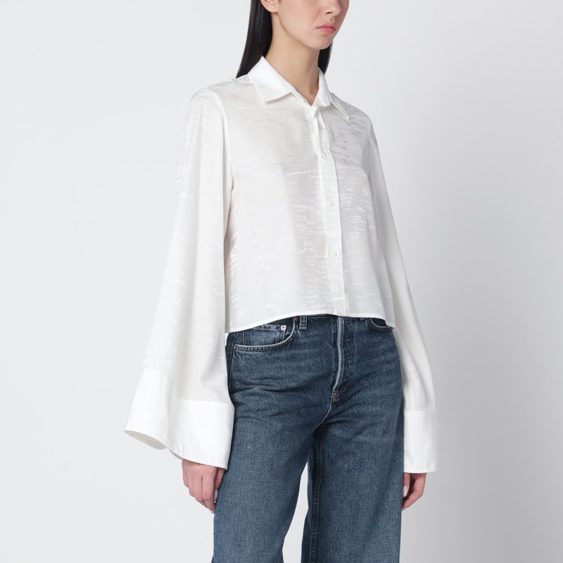 White shirt with all-over logo graphic